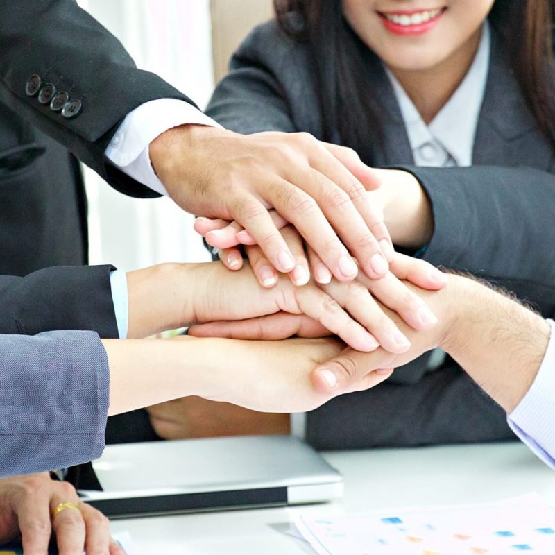 hand-of-teamwork-business-meeting-with-positive-result_t20_roYWVd-scaled.jpg
